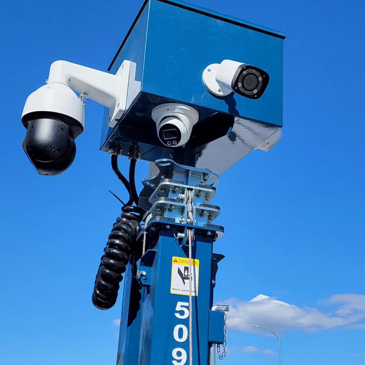 Close-up of SOS Sentinel camera mast with PTZ dome, unit 509