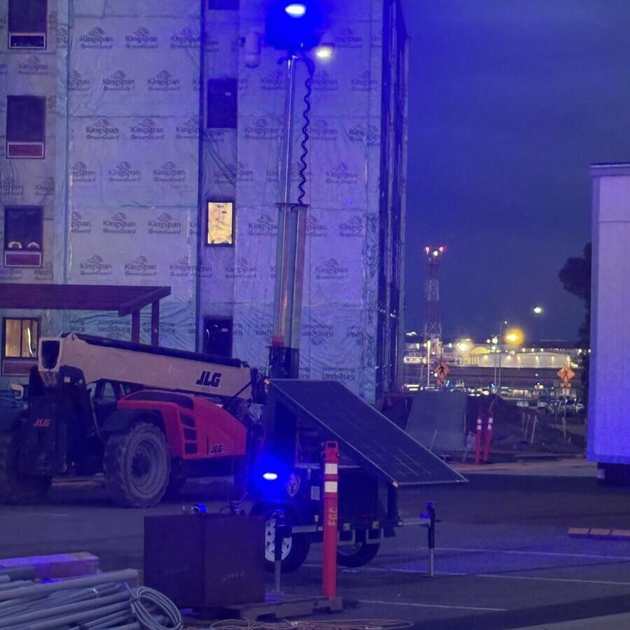 SOS Sentinel unit with blue strobe beacon during night deployment